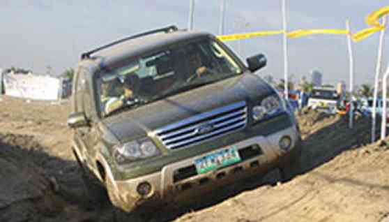 Ford introduces four SUVs, new president image