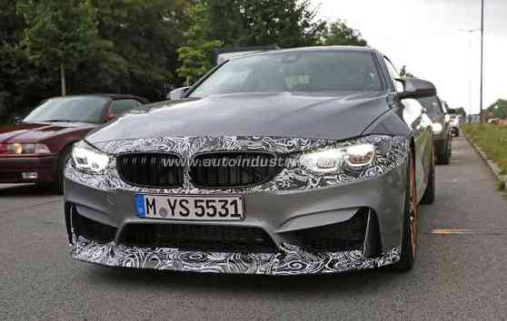Spied: Facelifted BMW M4 appears with mild camo image