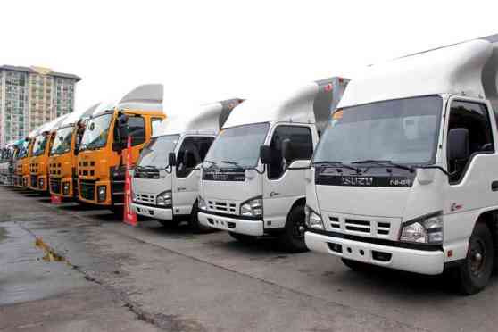 Isuzu PH turns over new truck models to Gapuzan Trucking Inc image