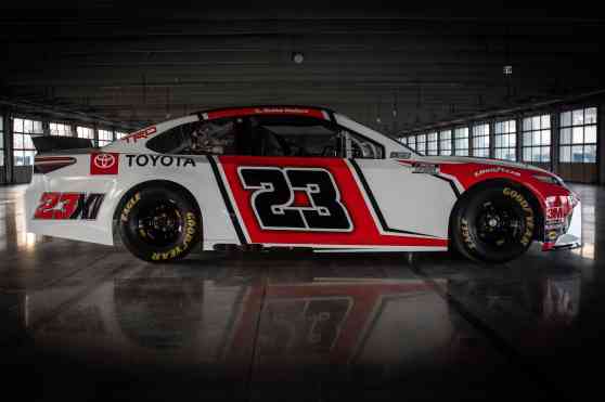 Jordan's NASCAR Toyota Camry shown with #23 and Bulls colors image