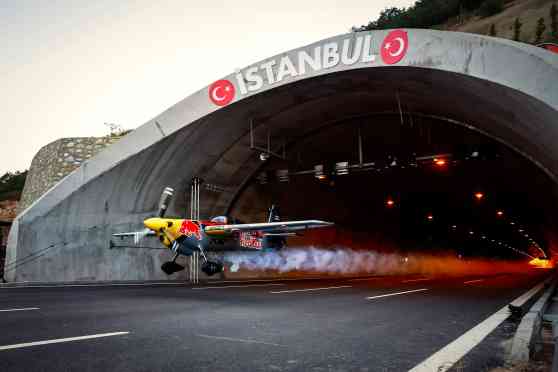 Watch: Red Bull stunt pilot just flew a plane through two tunnels image