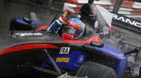 France Storms to Victory in Rain-Soaked Feature Race image
