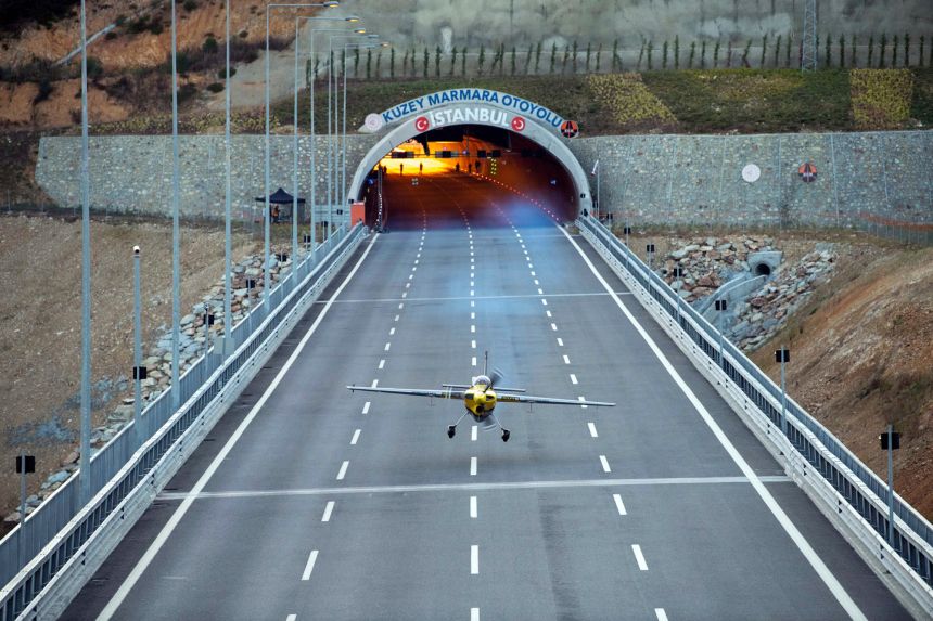 Watch: Someone just flew a plane through two tunnels image