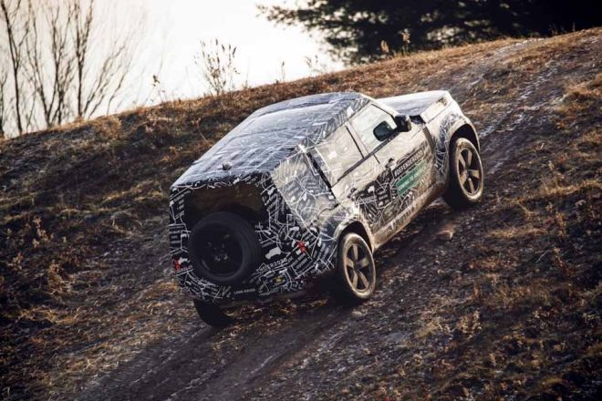 2020 Land Rover Defender wears camouflage for now image