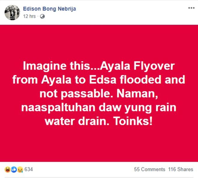 Knee-deep waters flood EDSA-Ayala Flyover due to blocked drainage image
