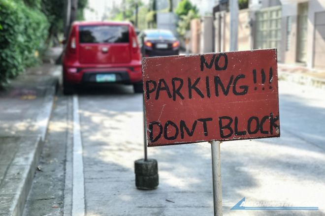 No such thing as reserved, exclusive parking slots image