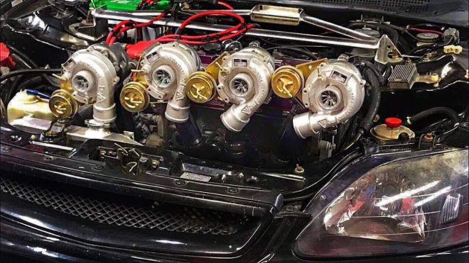 There is now a quad-turbo, tank-tracked Honda Civic in existence image