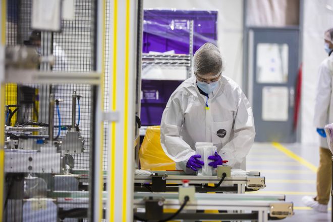 Ford begins mass production of respirators, face masks and medical gowns image