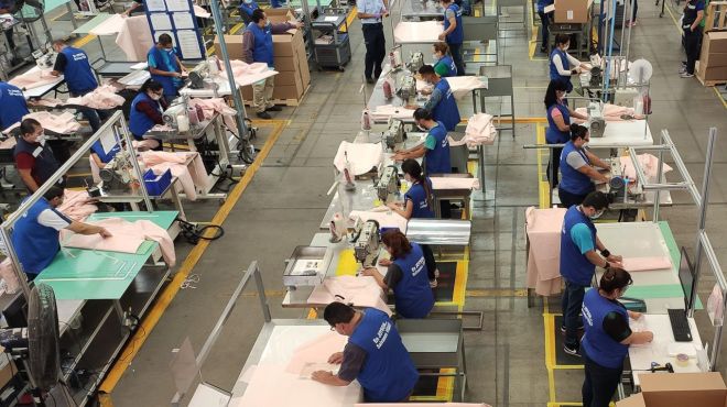 Ford begins mass production of respirators, face masks and medical gowns image