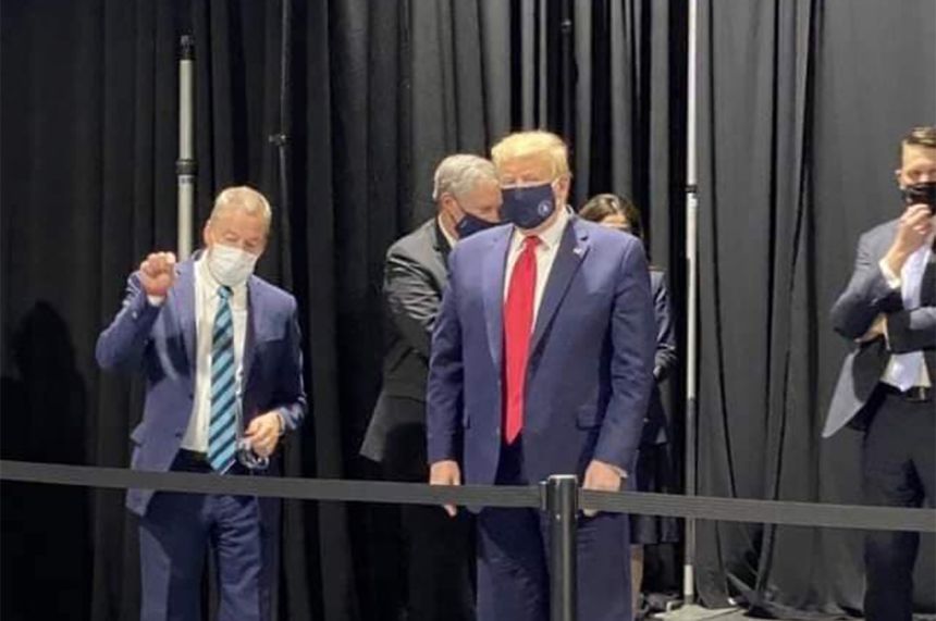 Ford in trouble because Trump didn't wear his mask at the factory image