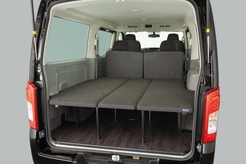 Nissan just gave the the NV350 Urvan a bed and table image