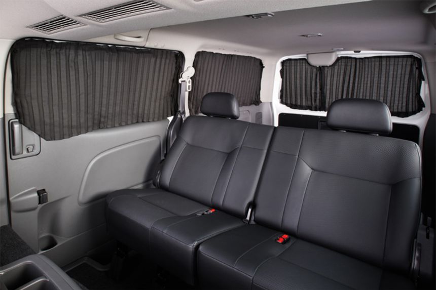 Nissan just gave the the NV350 Urvan a bed and table image