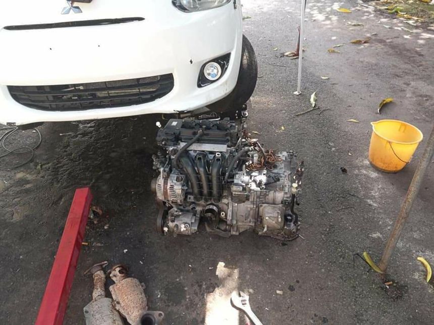Someone is swapping a Montero V6 into a Mitsubishi Mirage image