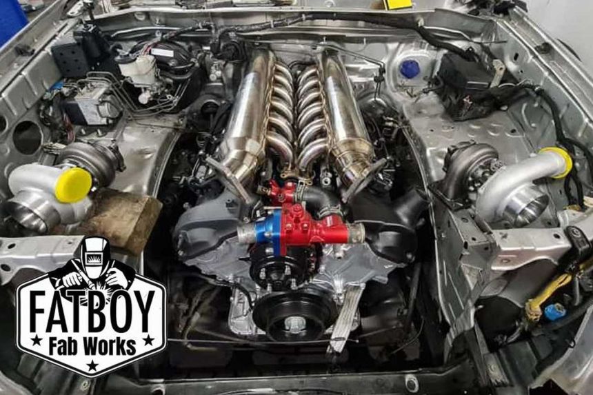 Someone actually built a twin-turbo V12 Toyota Hilux image