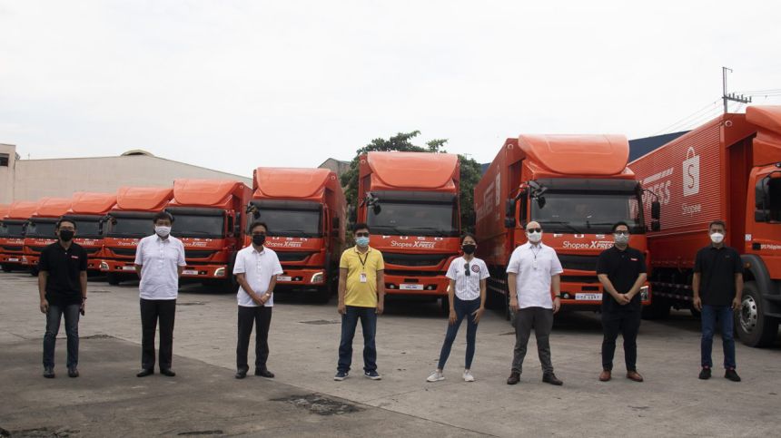 Fuso PH turns over 10 new FJ Wing Van trucks to Shopee image