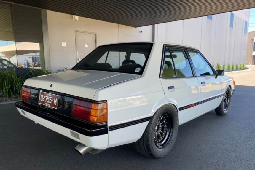 This 2JZ-swapped Lancer Boxtype is scary awesome image