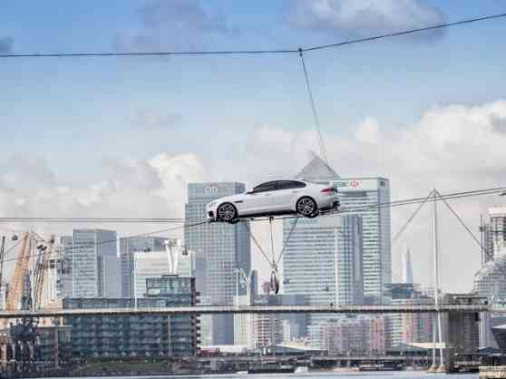 2016 Jaguar XF revealed via high-wire stunt 2016 Jaguar XF revealed via high-wire stunt image