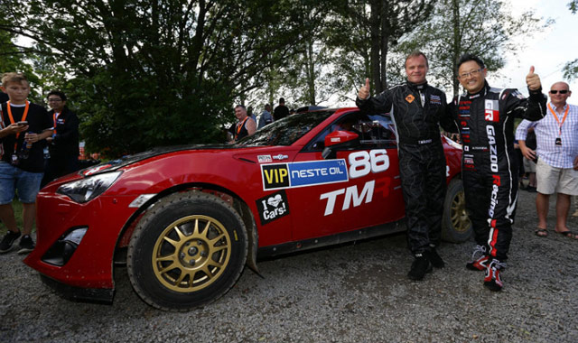 Tommi Makinen (left) and Toyota CEO Akio Toyoda (right)
