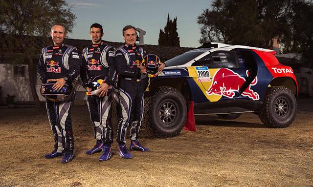 The 3 drivers along with the Peugeot 2008 DKR