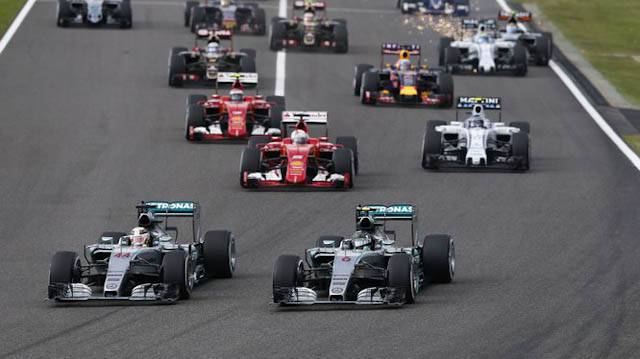 Hamilton leads Rosberg into turn 1
