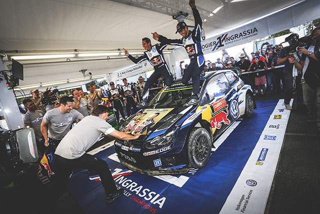 Ogier scores a hat trick