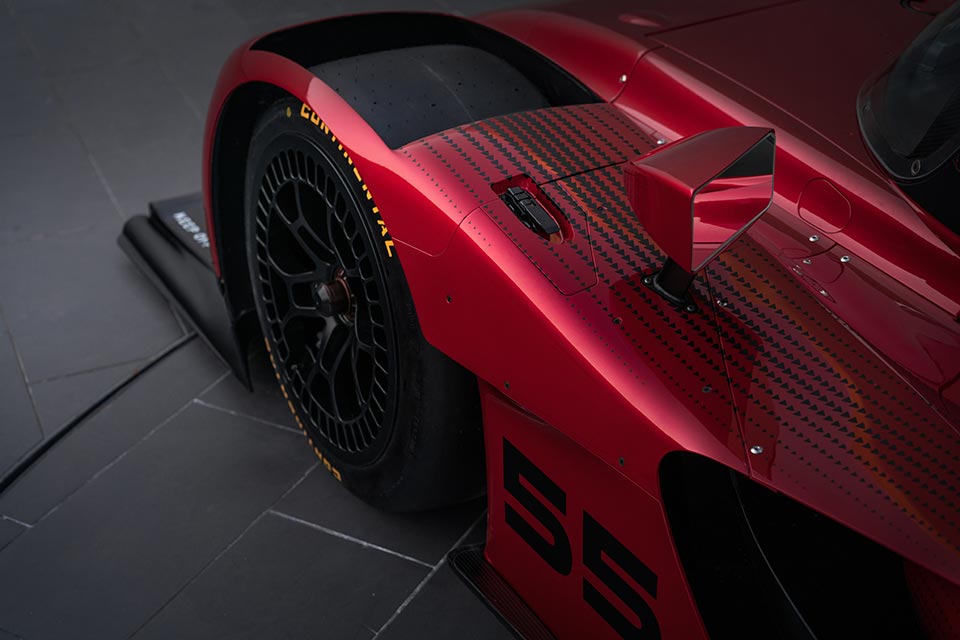 The slick Continental tires on the Mazda RT24-P