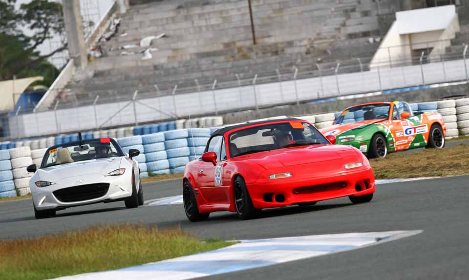 The Miatas taking on Clark