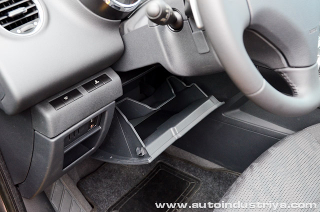 Driver's side storage compartment
