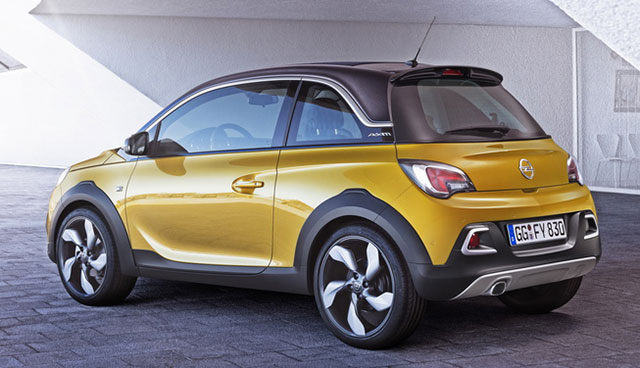 The rear of the Opel Adam Rocks has a roof spoiler and a chrome exhaust