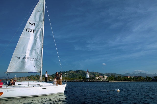 Sailing by Lighthouse Marina Resort