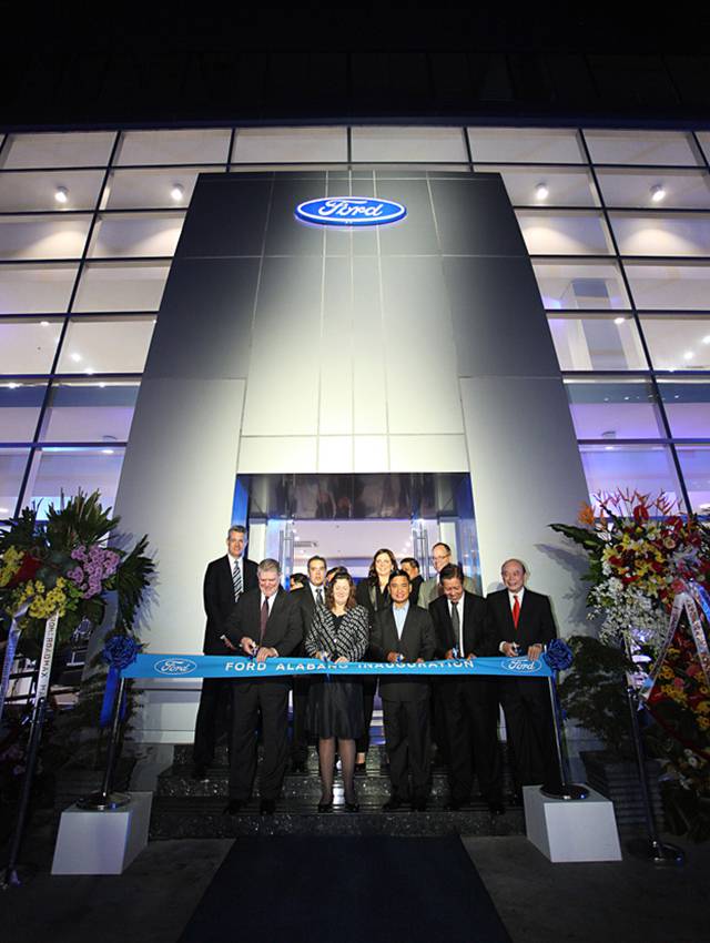The cutting of the ribbon at Ford Alabang