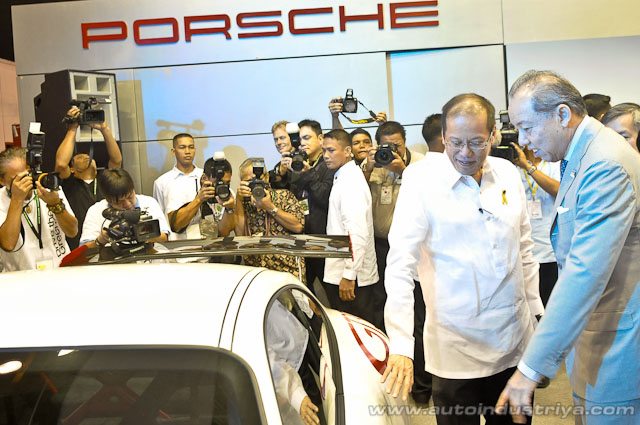 President Aquino with Robert Coyiuto Jr. at Porsche