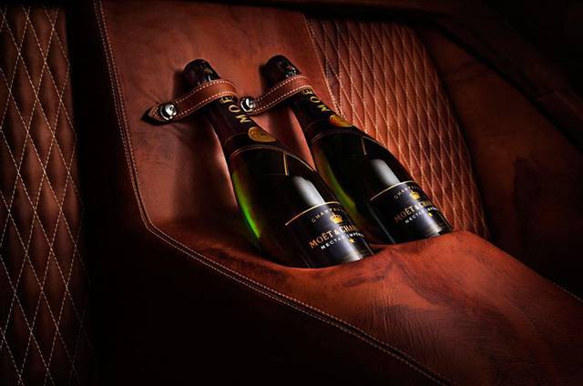 The chapagne/ wine bottle holders at the rear seats