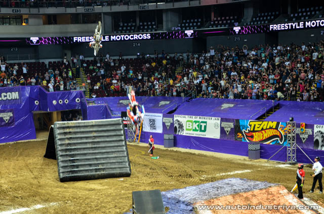 The dirt bikers doing their stunts and tricks