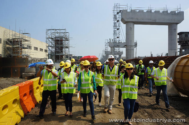 MNTC personnel showing the media around the project