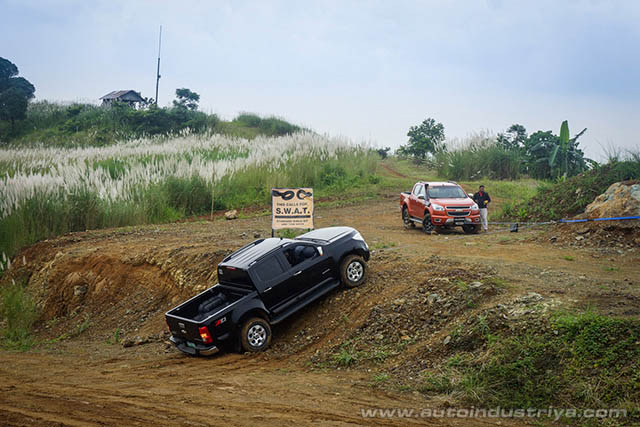 A downed Colorado being pulled out of a ditch by a Colorado Tracker Pro