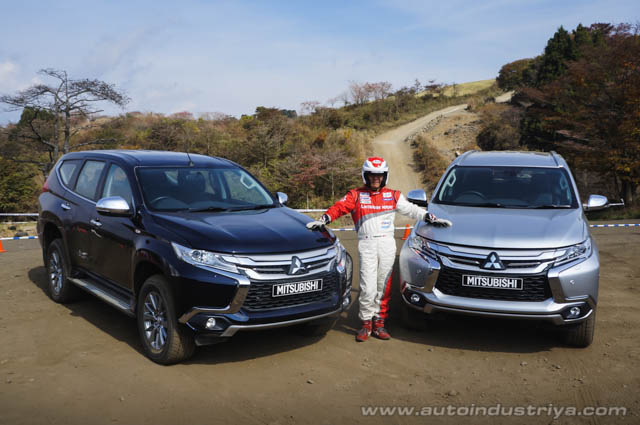 Hiroshi Masuoka beside two all-new Mitsubishi Montero Sport units.