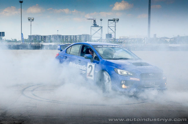 Russ Swift doing stunts in Subaru WRX STI