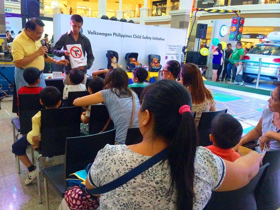 Kids being taught basic road safety and signs