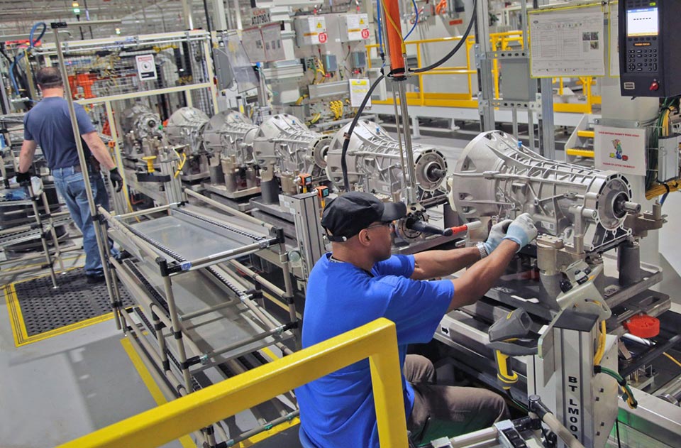 Workers at Ford's Livonia plant assembling transmissions
