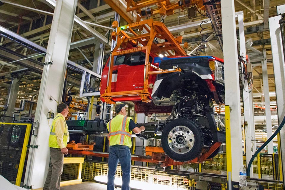 Workers finshing assembling a Ford F-Series truck at the Ohio assembly plant