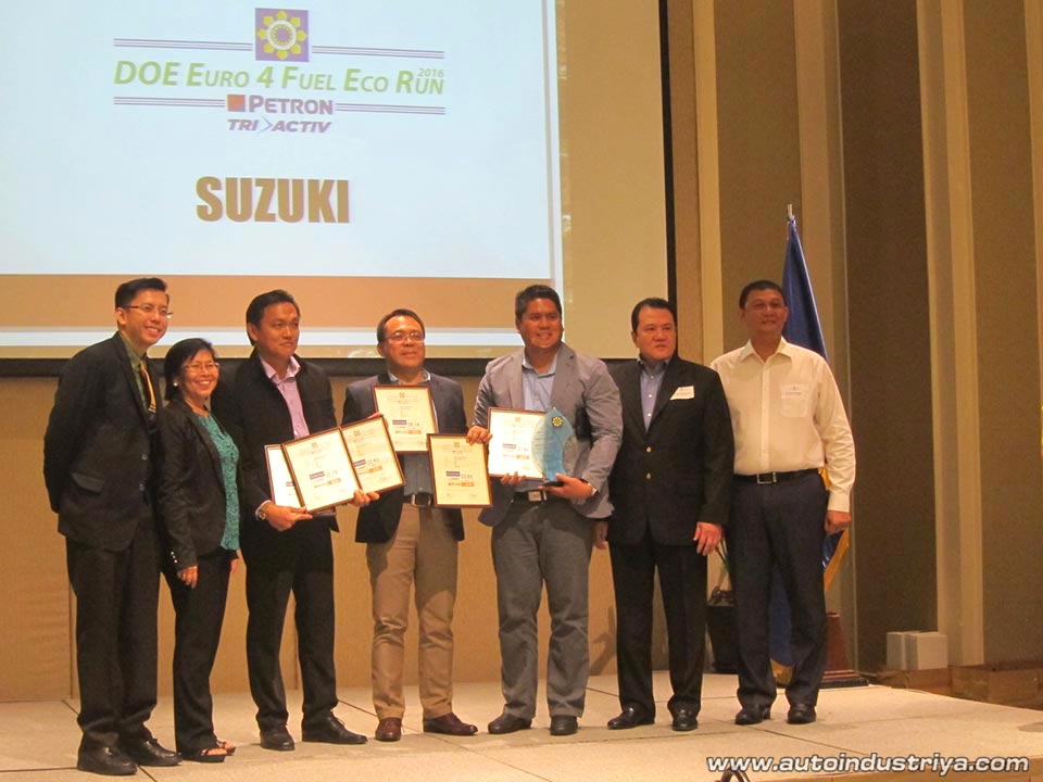 Suzuki Philippines receiving the rewards and plaques