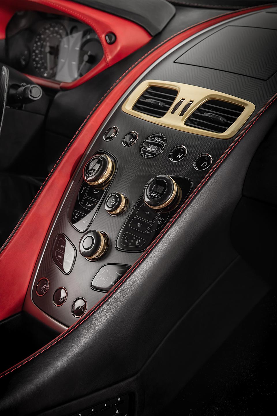 The center console sporting carbon fiber and anodized bronze accents