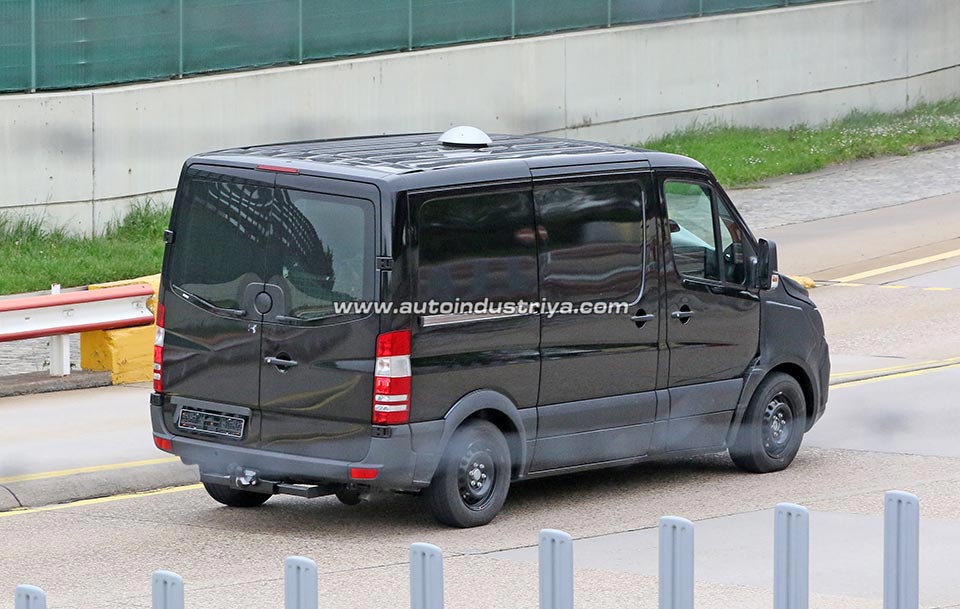 Rear quarter of the 2018 Mercedes-Benz Sprinter test mule