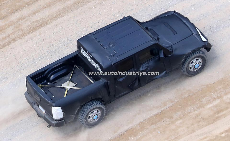 The rear quarter of the Wrangler-based pickup