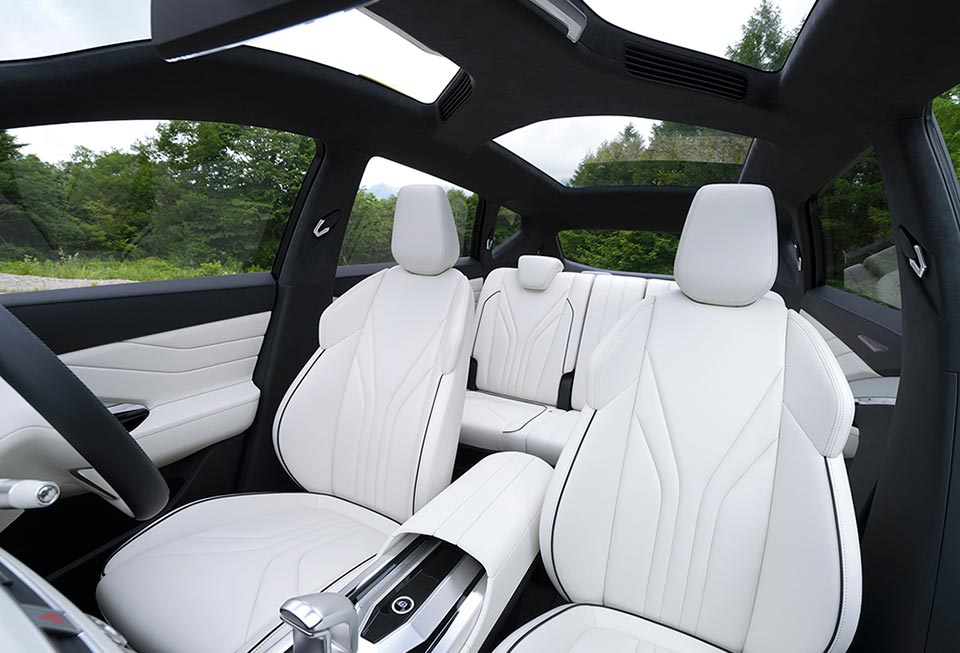 The white seats and glass roof inside the 2016 Mitsubishi XM concept