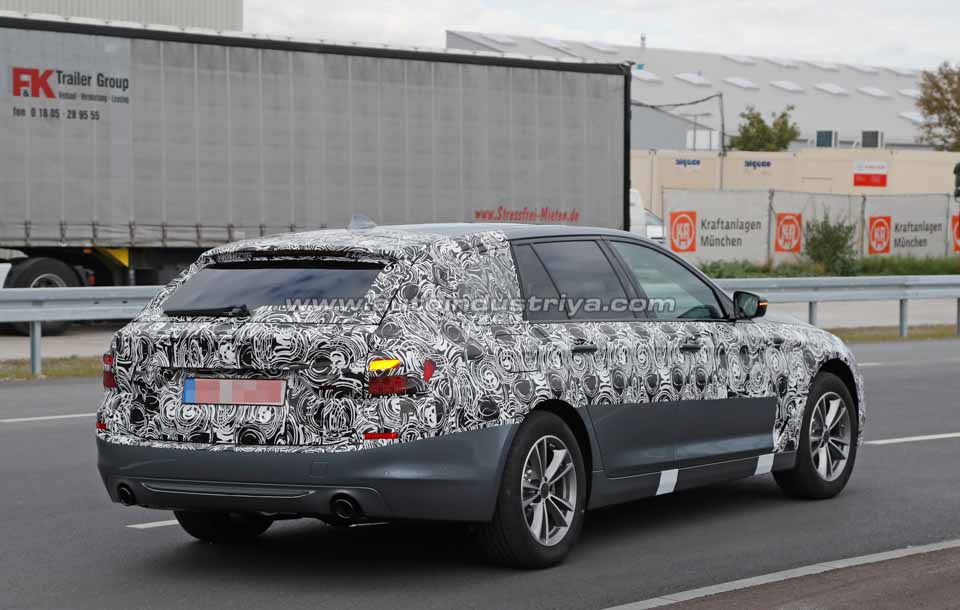 Rear quarter of the camouflaged new-gen BMW 5-Series Touring