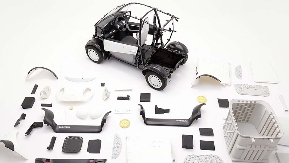 The parts of the Honda Micro Commuter EV laid out