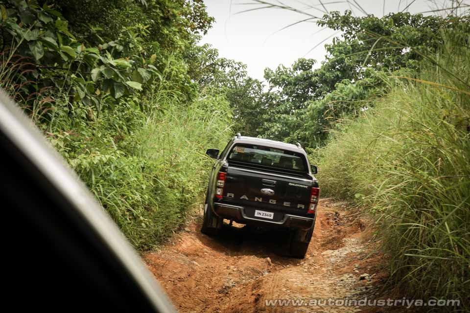 Climbing a rocky hill going to Mt. Balagbag's summit
