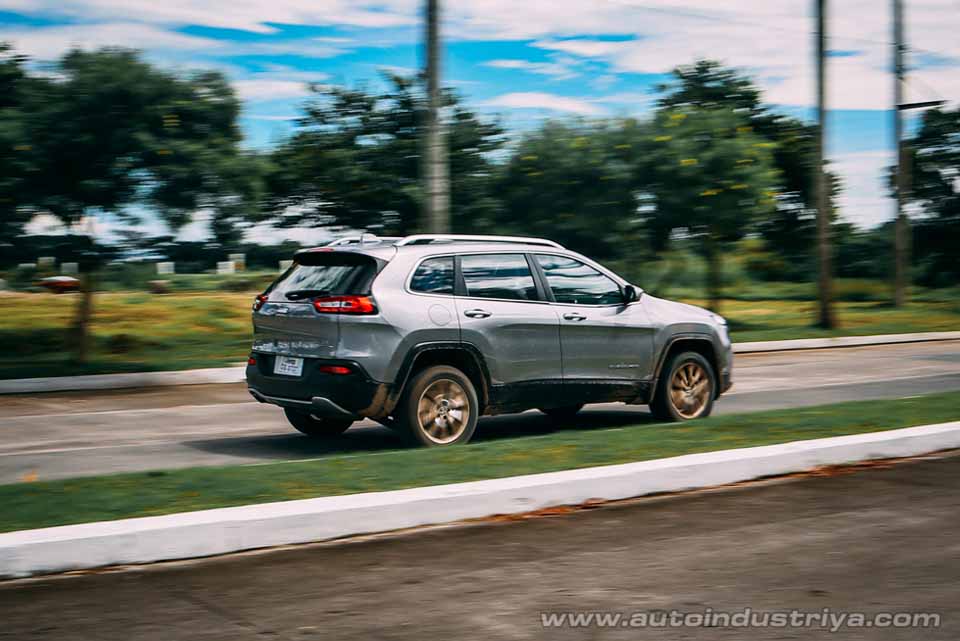 The mudded Jeep Cherokee on paved roads